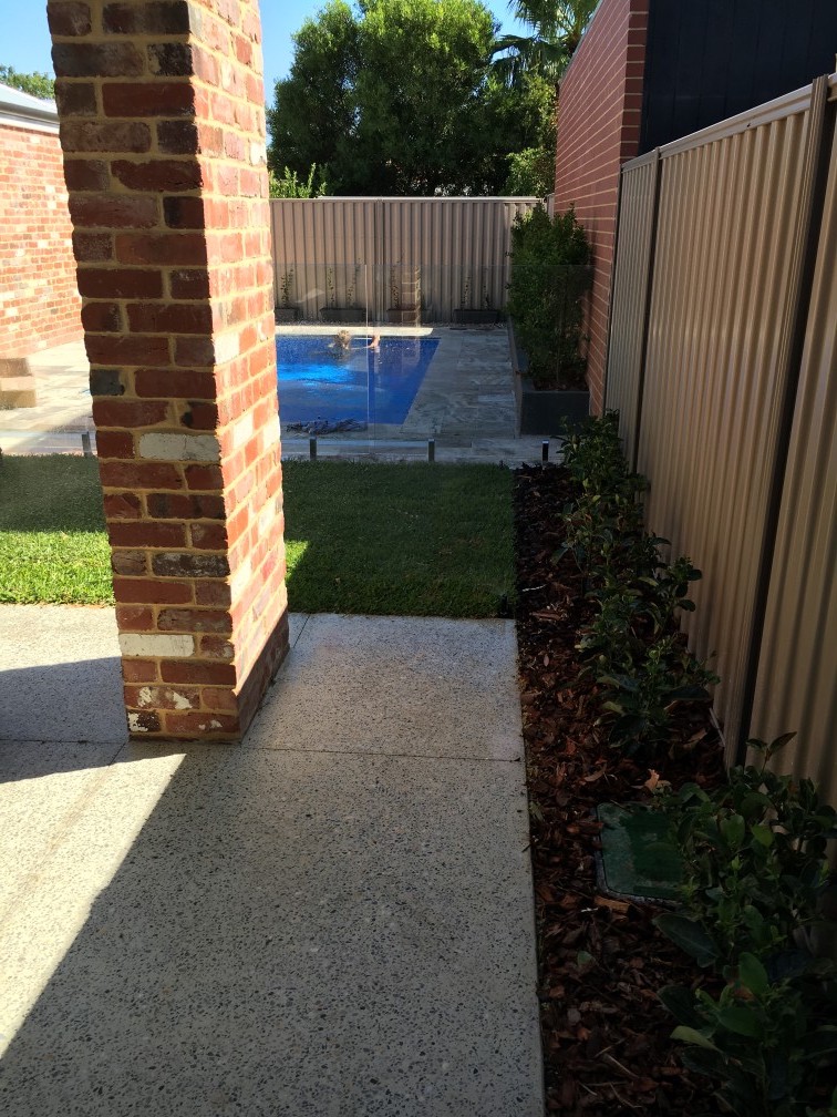 Finished granite pavements near swimming pool and backyard.